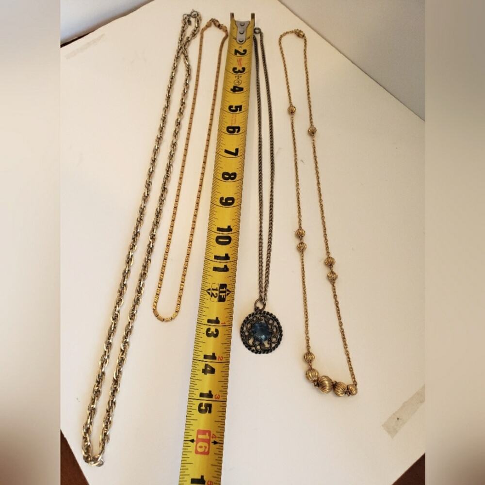 Bundle of four necklaces 1 Sarah Coventry gold tone, 1 beaded gold tone 1 nickel